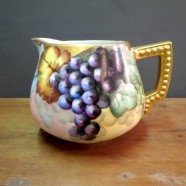antique Bavarian hand-painted pitcher with grape and leaf motif – $195