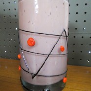 Vintage pink art glass vase – $45